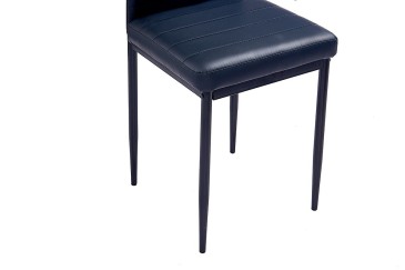 Conjunto de 4 sillas tapizadas en Polipiel de color Negro